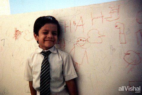 Vishal K. Bharadwaj, circa 1986, in the balcony of his family's apartment in Ghusais, Dubai. Photo by either Keshav or Sneha Bharadwaj.