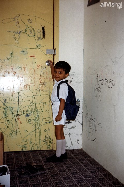 Vishal K. Bharadwaj, circa 1986, at the door of his family's apartment im Ghusais, Dubai. Photo by either Keshav or Sneha Bharadwaj.