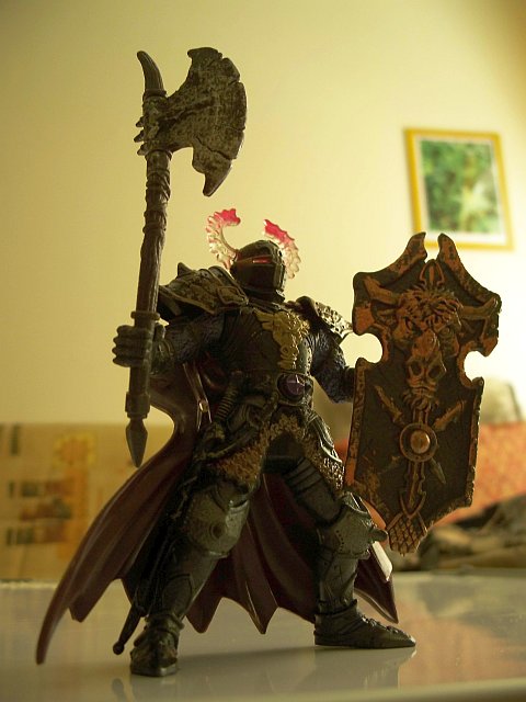 Action Figure of Dark Armoured Warrior with axe and shield