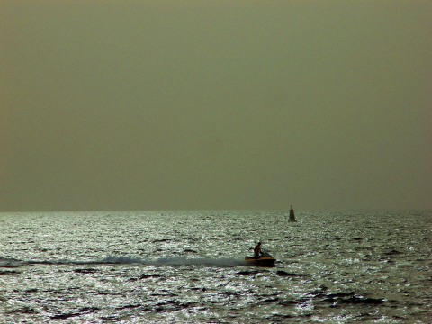 View of the sea from Palm Jumeirah crescent, with a jet-ski