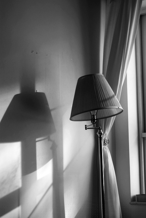 Lamp next to a curtain