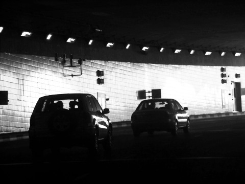 Black and White photo of cars in the undersea tunnel of the Palm Jumeirah