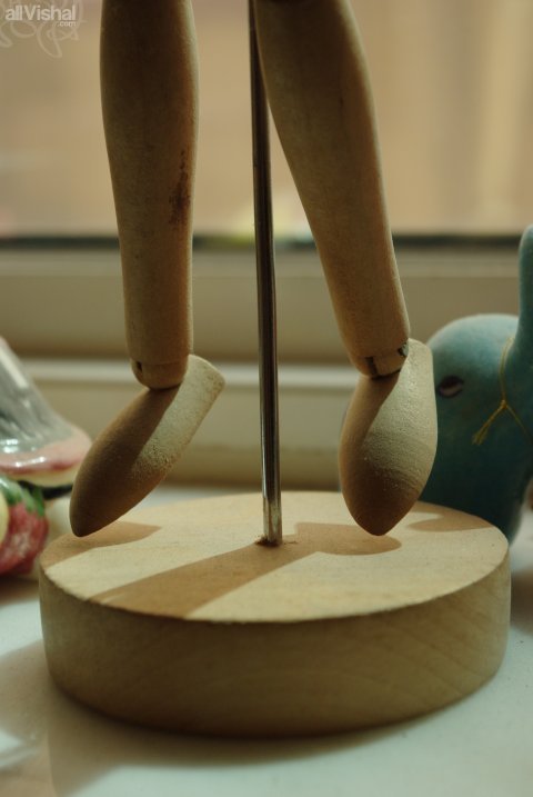 The legs of an artist's mannequin